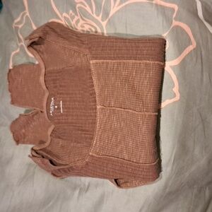 A brown long sleeve